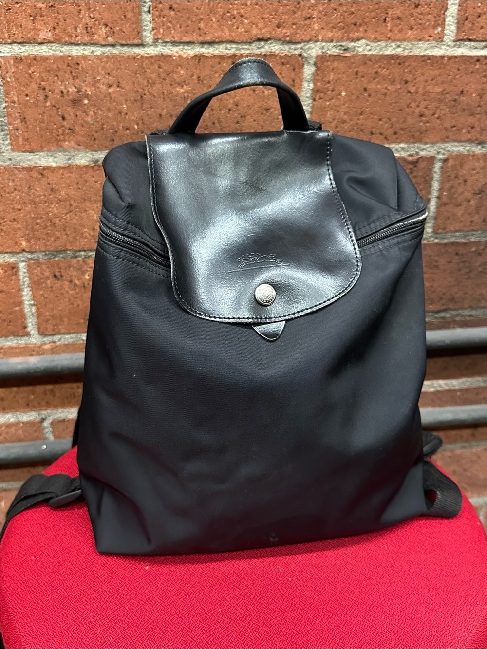 Black Longchamp Le Pliage backpack